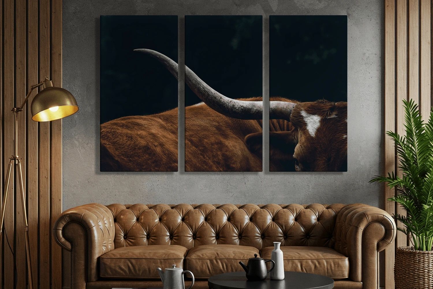 Three-panel longhorn canvas above a leather sofa